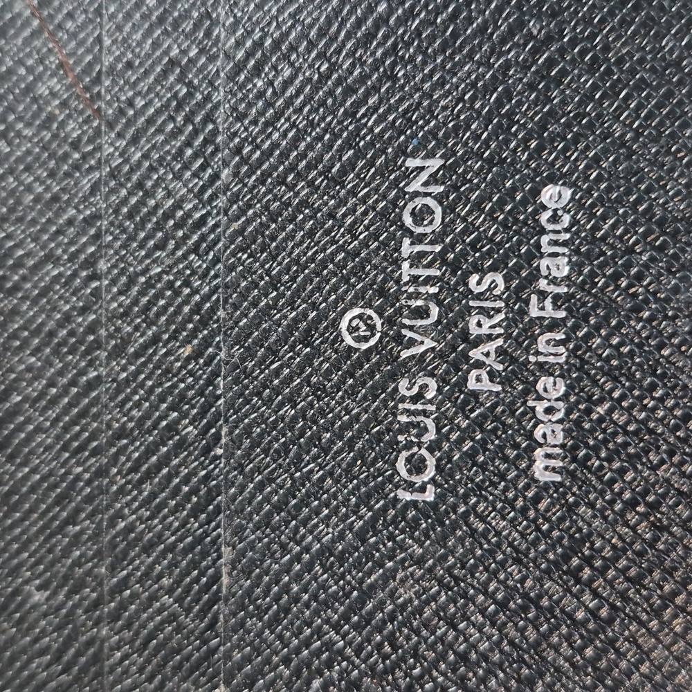 Louis Vuitton Black Taiga Leather Slender Bifold Wallet, Onesize, Black. - Picture 6 of 7